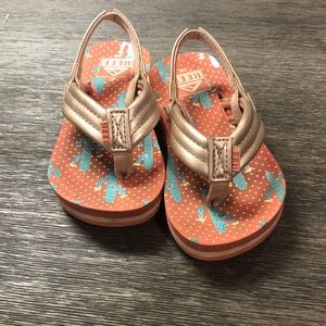 Pink and gold Reef flip flops